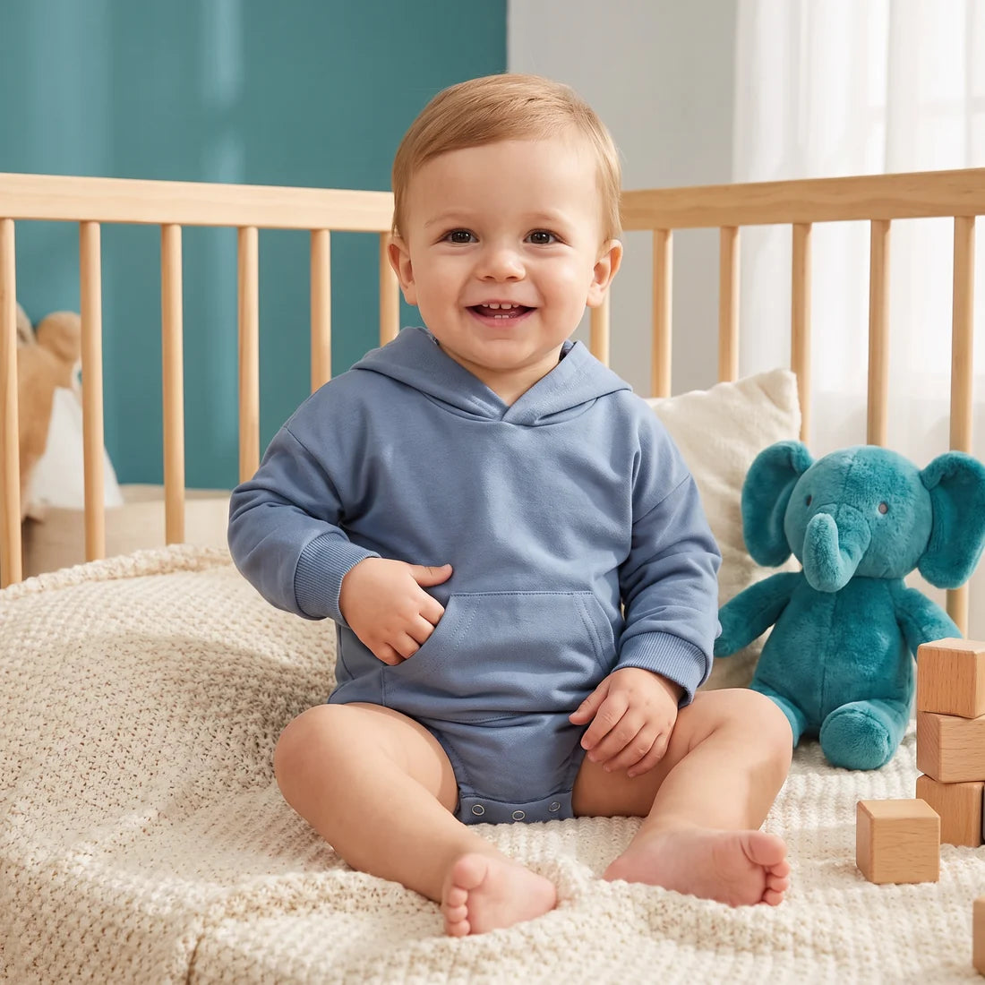 Babyromper met capuchon – Zachte jumpsuit met lange mouwen en voorzak